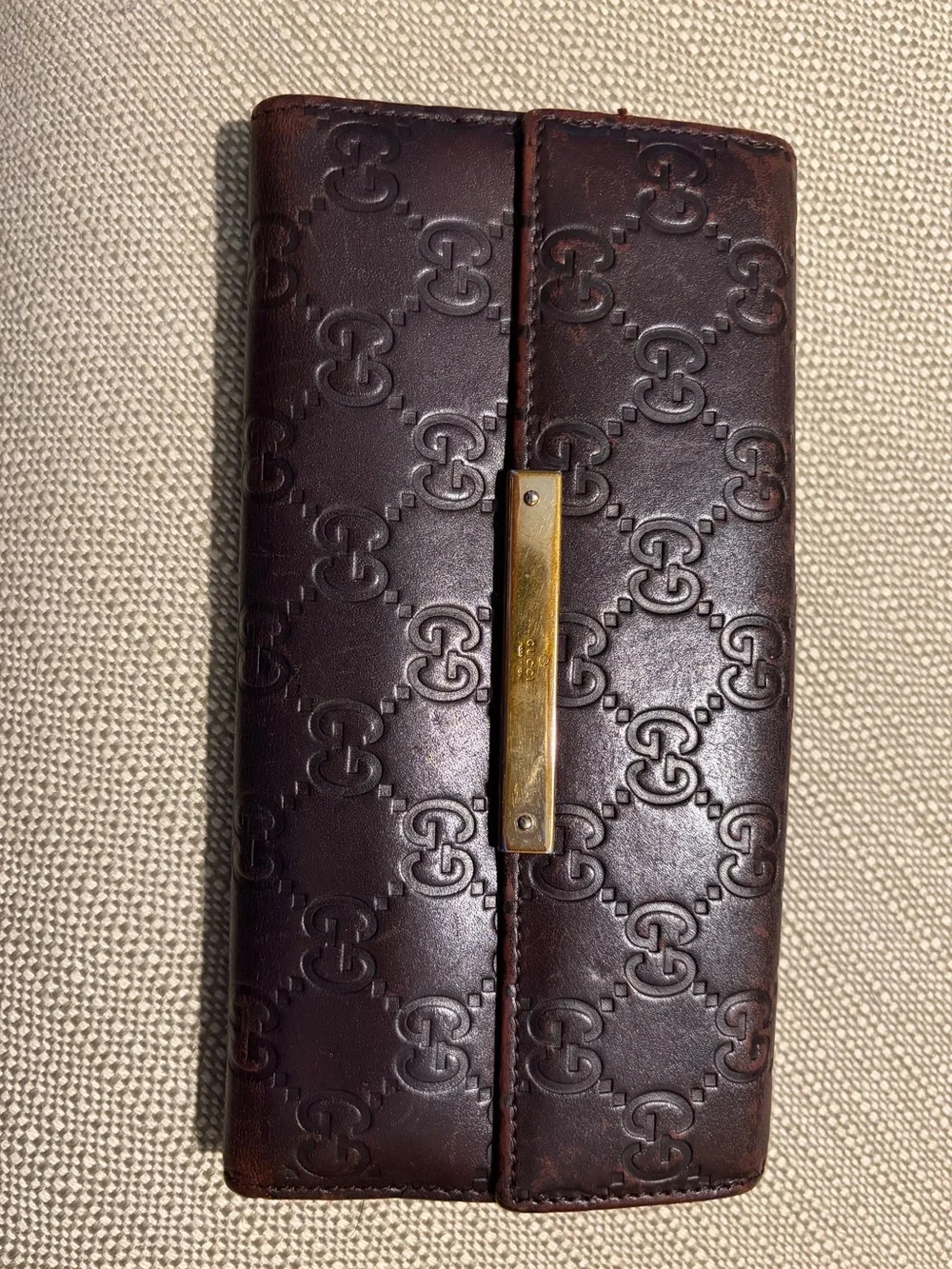 Authentic Gucci Brown Leather Continental Wallet with Embossed GG